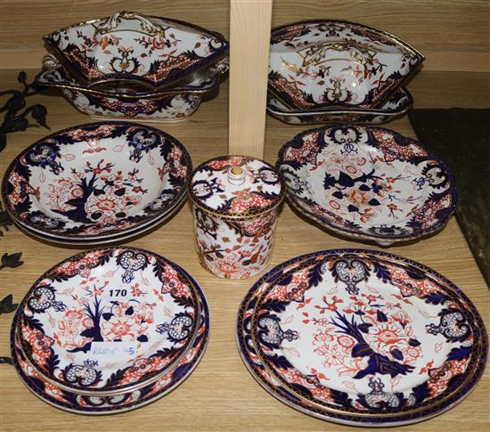 A collection of Derby Imari patterned dinner ware
